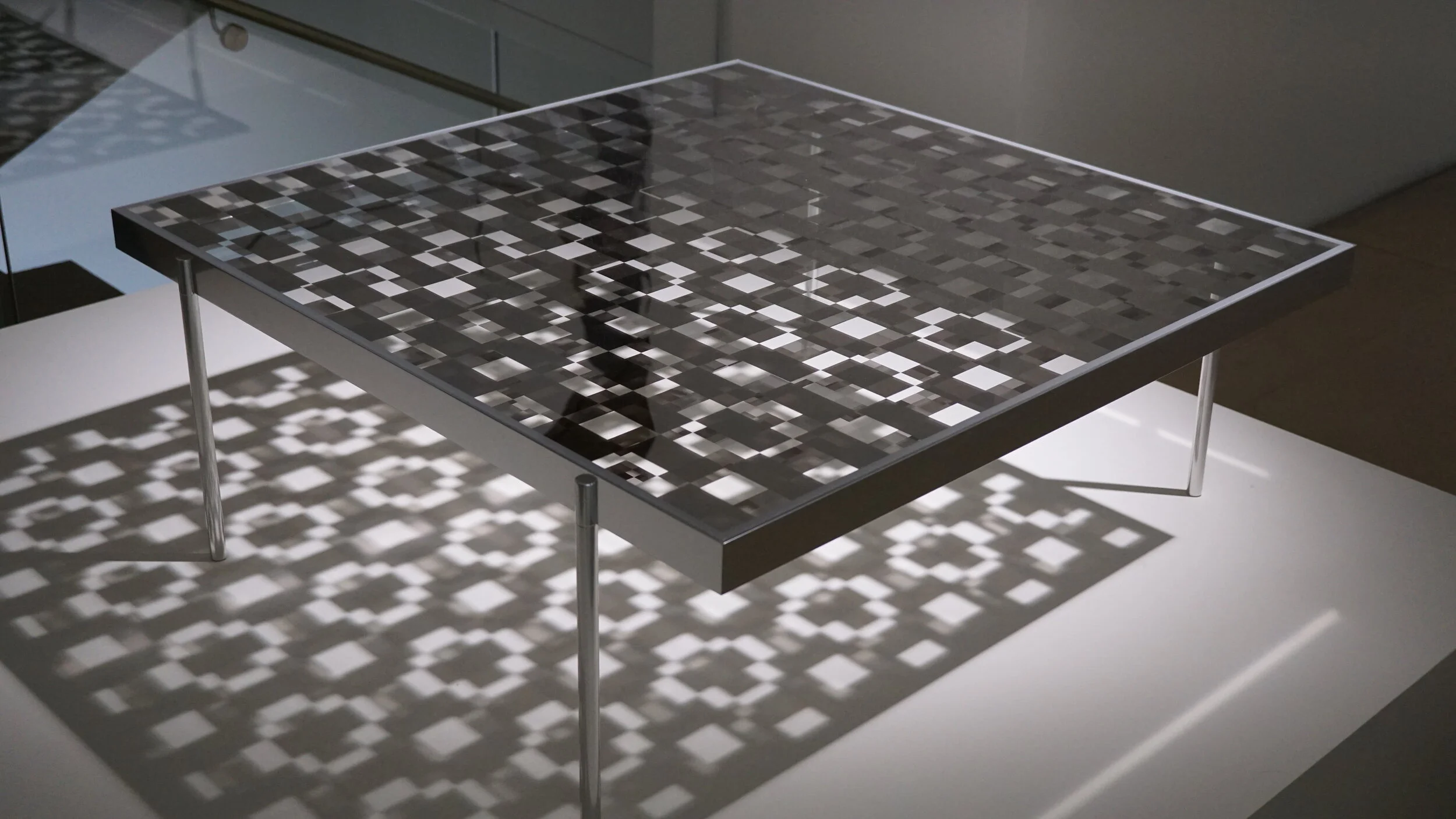 Table with repeating glass pattern, Salone del Mobile, Milan